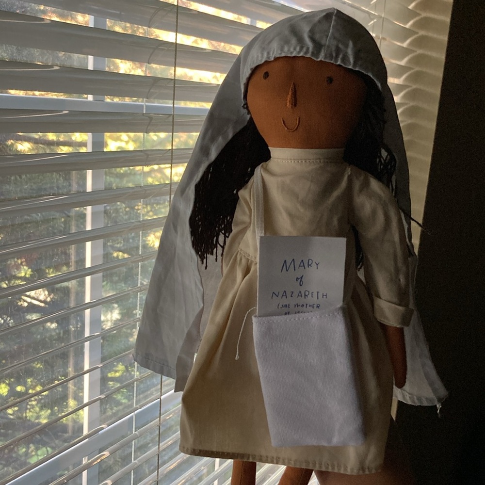 Mary on the mantle doll